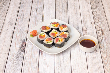 Maki sushi is therefore a roll of nori seaweed stuffed with rice and different ingredients such as fish, shellfish
