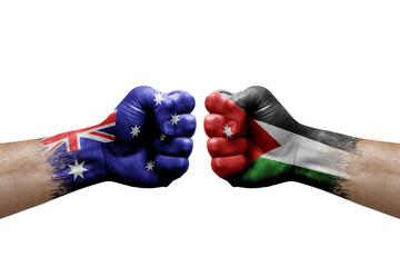 Two hands punch to each others on white background. Country flags painted fists, conflict crisis concept between australia and jordan