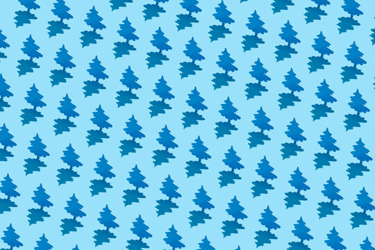 Seamless pattern of blue fir trees
