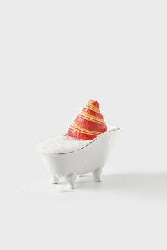 Croissant in bathtub with foam