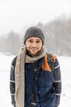 Smiling guy under the snow