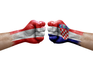 Two hands punch to each others on white background. Country flags painted fists, conflict crisis concept between austria and croatia - obrazy, fototapety, plakaty