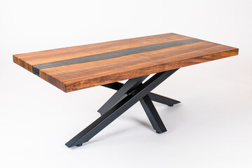Curly Bastogne Walnut wooden coffee table with black epoxy resin and metal legs. White studio...