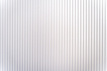 White plastic surface texture with vertical lines