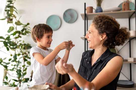 Parent And Child Making Ceramics