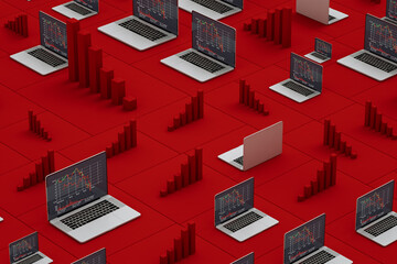 Laptops showing stock market statistics on screen