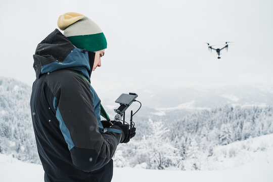 Man piloting a large drone 