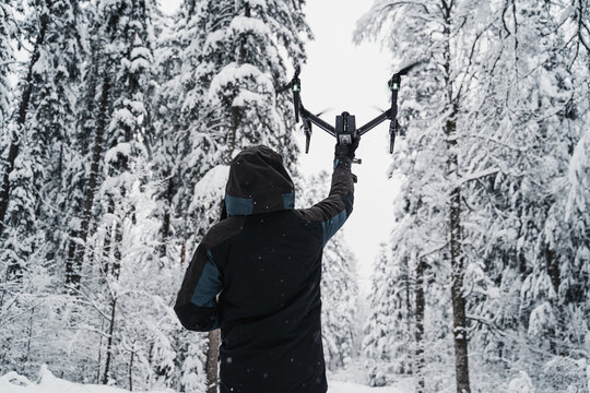  Launching a drone from hand in forest 