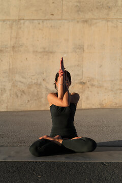 Woman Practicing Yoga Outdoor