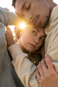 Close-up portrait of expressive couple