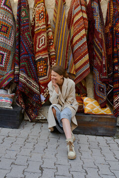 a woman walks through the old market