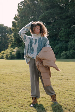Young woman bundled up in style.