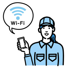 スマホを持ってWi-Fiの説明をしている作業服の若い女性
