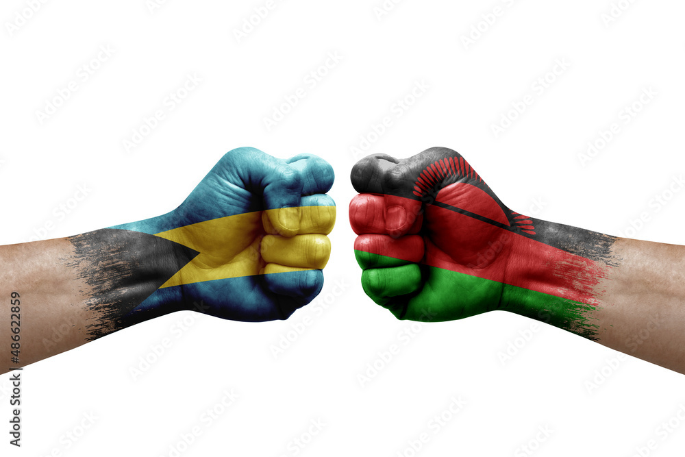 Wall mural Two hands punch to each others on white background. Country flags painted fists, conflict crisis concept between bahamas and malawi