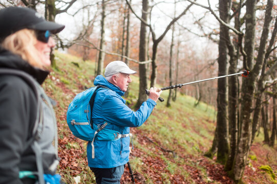 Senior hikers finding the best route