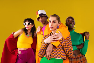 Multiracial models in colorful vintage clothes
