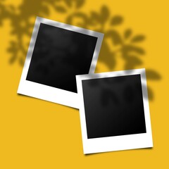 Empty two vintage foto frame mock up with realistic drop shadow effect isolated on yellow background.