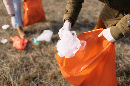 Volunteers Collecting Garbage in Nature 