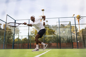 Man playing tennis