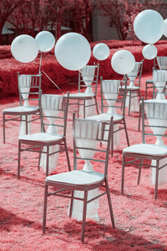 Infrared photography of Wedding chairs with balloons 