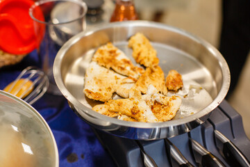 cooking meat in a frying pan without oil