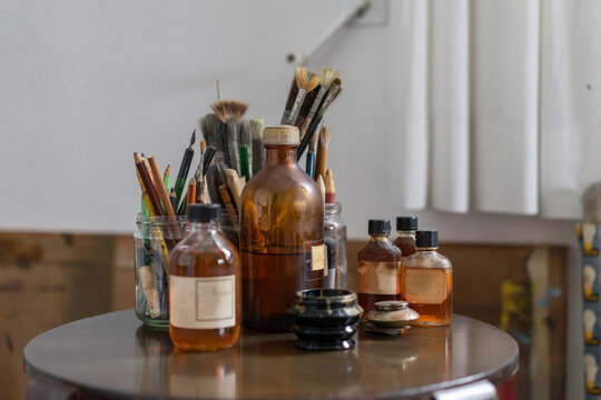 Detail of vintage paint, dyes and brushes