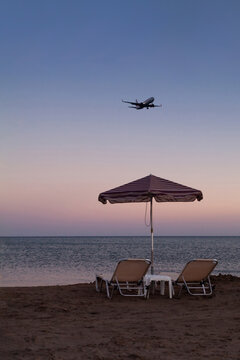 tourism, airplane arriving to beach, summer holidays