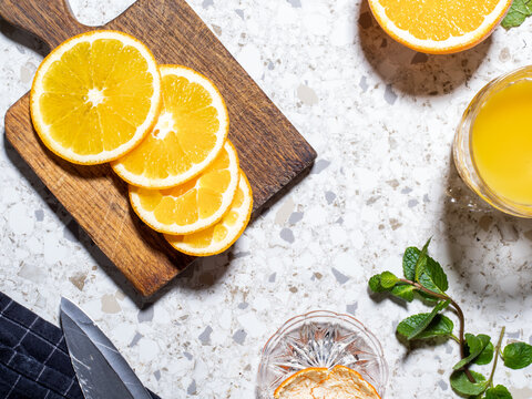 Orange cut on the marble countertop