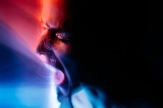 Colorful portrait of a girl sreaming