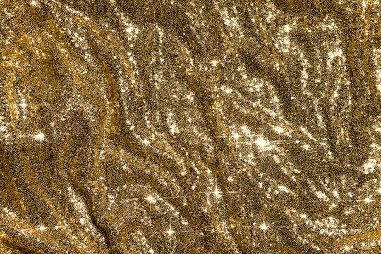 Shiny golden sequin background
