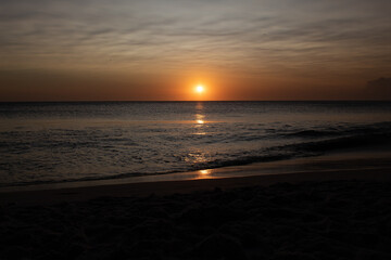 Sunset with golden reflection in the sea