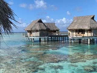 hut on the sea in a Tahitian island 