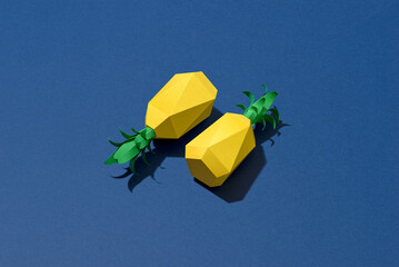 Two pineapple on a blue background