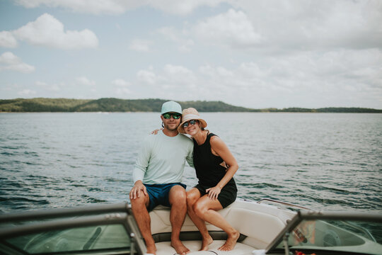 happy couple relaxing on a boat