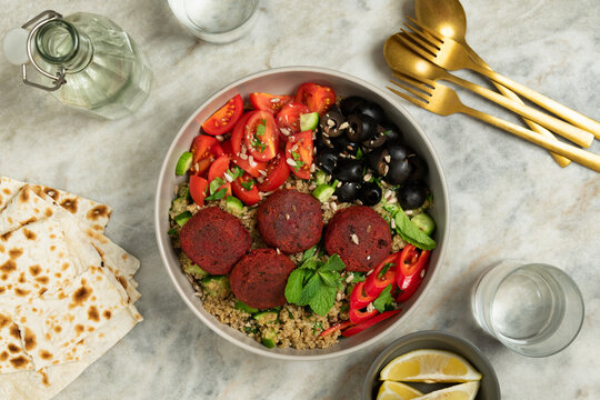 Beet falafel Mediterranean vegan style bowl with quinoa