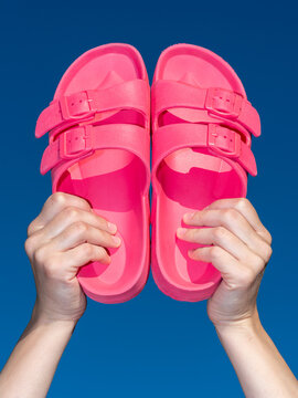 A pair of pink summer sandals