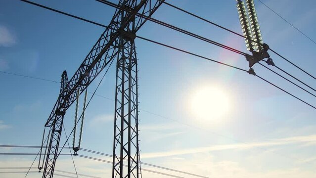 High voltage power line with insulation divider of electric power wires for safe delivering of electrical energy through steel cable on long distance
