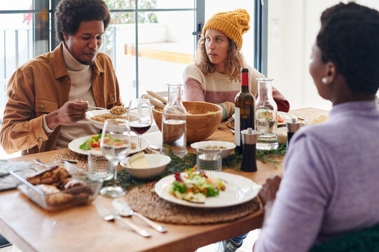 Man having dinner with some friends