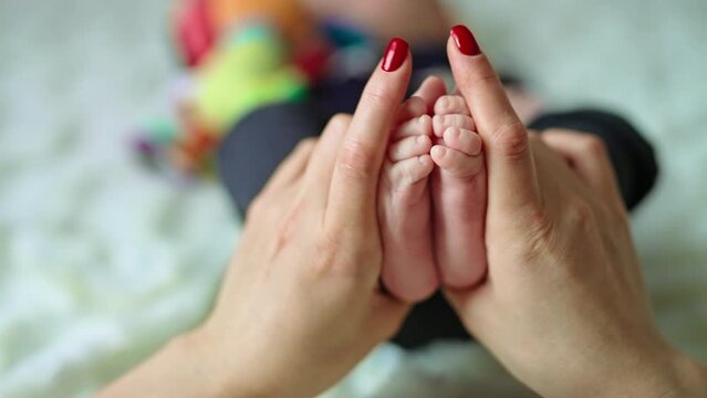 Newborn baby fingers. Close up view of baby feet.