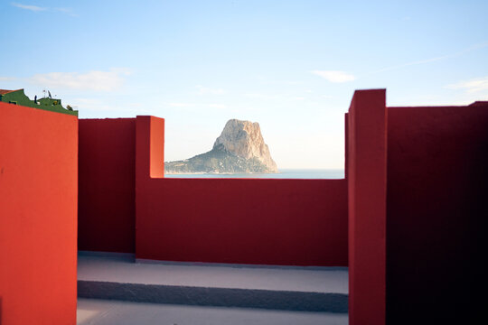 Red Geometric Wall With Mountain 