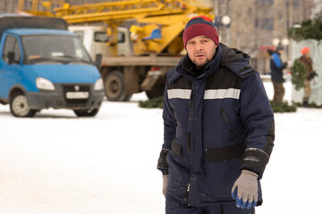 Close-up portrait of a worker at a construction site