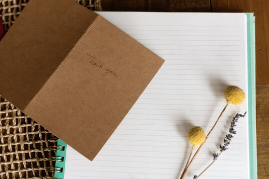 Open thank you card on table