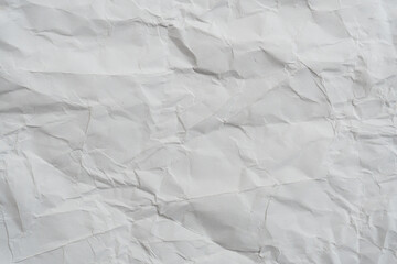 Fototapeta premium White crumpled paper texture background.