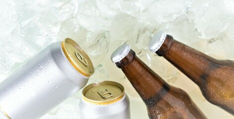 beer cans and bottles chilled in ice 