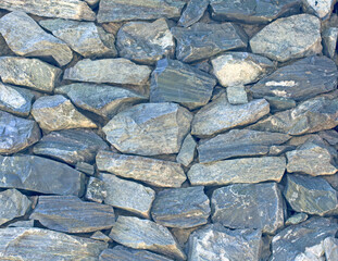 Texture of a stone wall. Old castle stone wall texture background. Stone wall as a background or texture. Part of a stone wall, for background or texture
