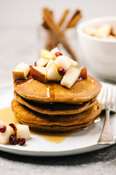 Gingerbread pancake stack with syrup