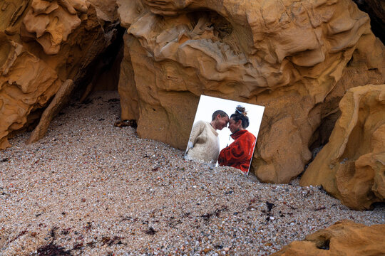 Friendship in a mirror on a beach 