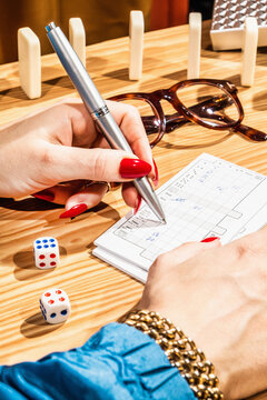 Retirement table games night/bingo, yahtzee dominos