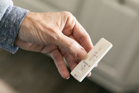 Woman Holds Negative Covid-19 Test