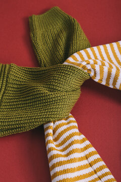 Two sweaters on a background